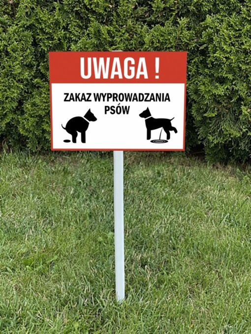 Uwaga Zakaz wyprowadzania psów tabliczka na trawnik na słupku trzonku